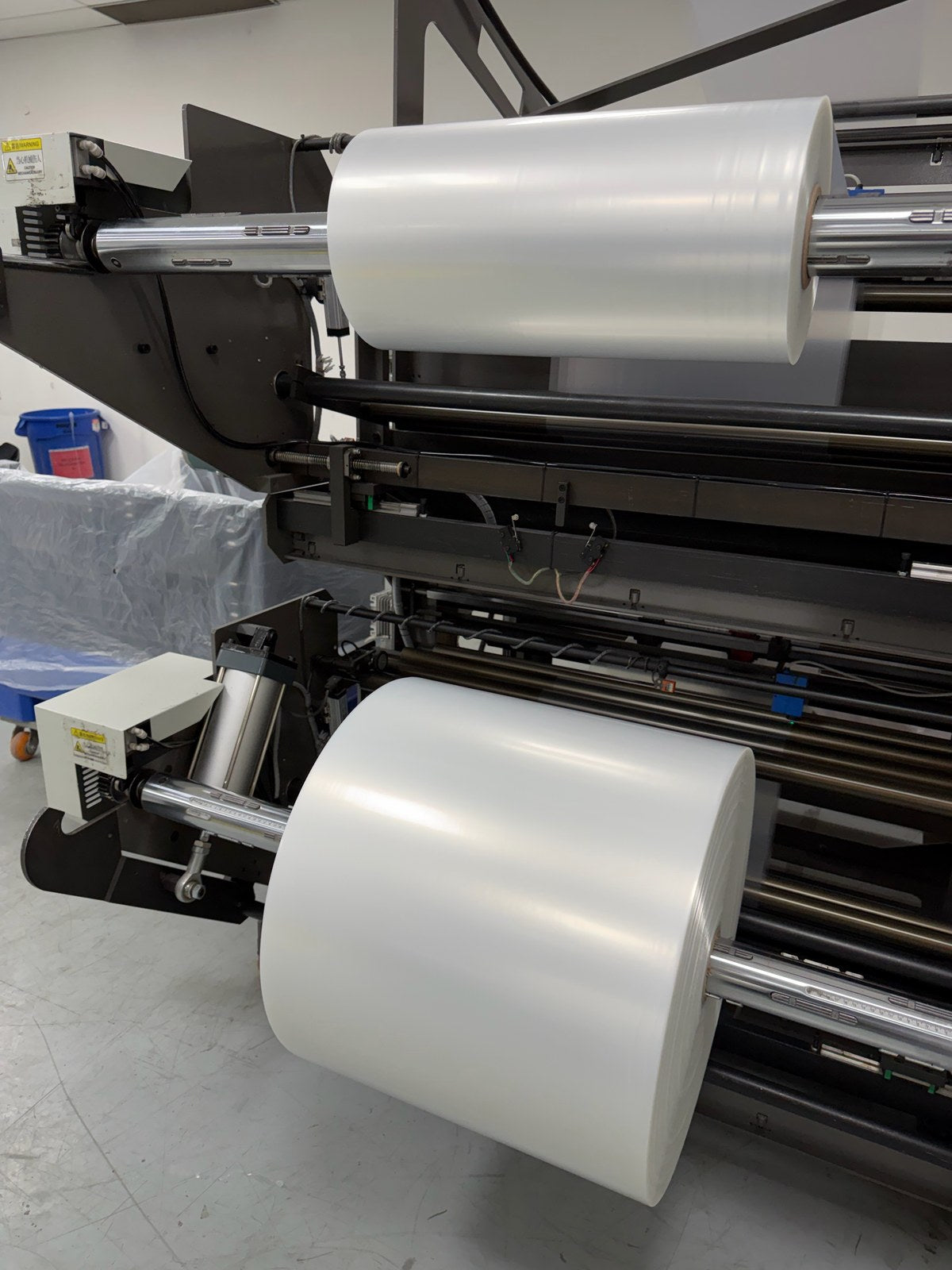 Polyethylene film rolls mounted on a bag machine at the Armovac plant